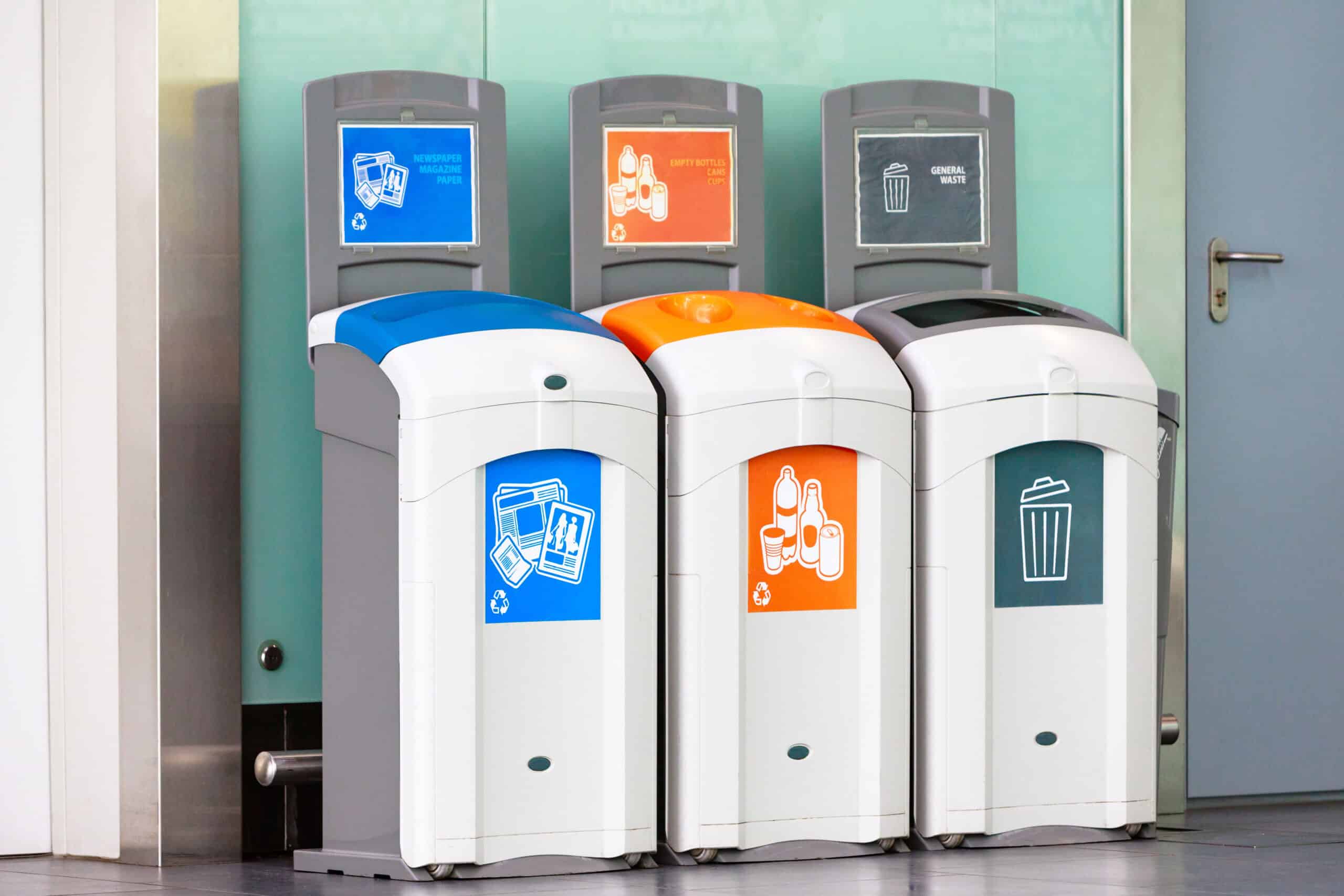 Rubbish bins for different garbage - plastic, empty bottles, newspaper, magazine paper and general waste.